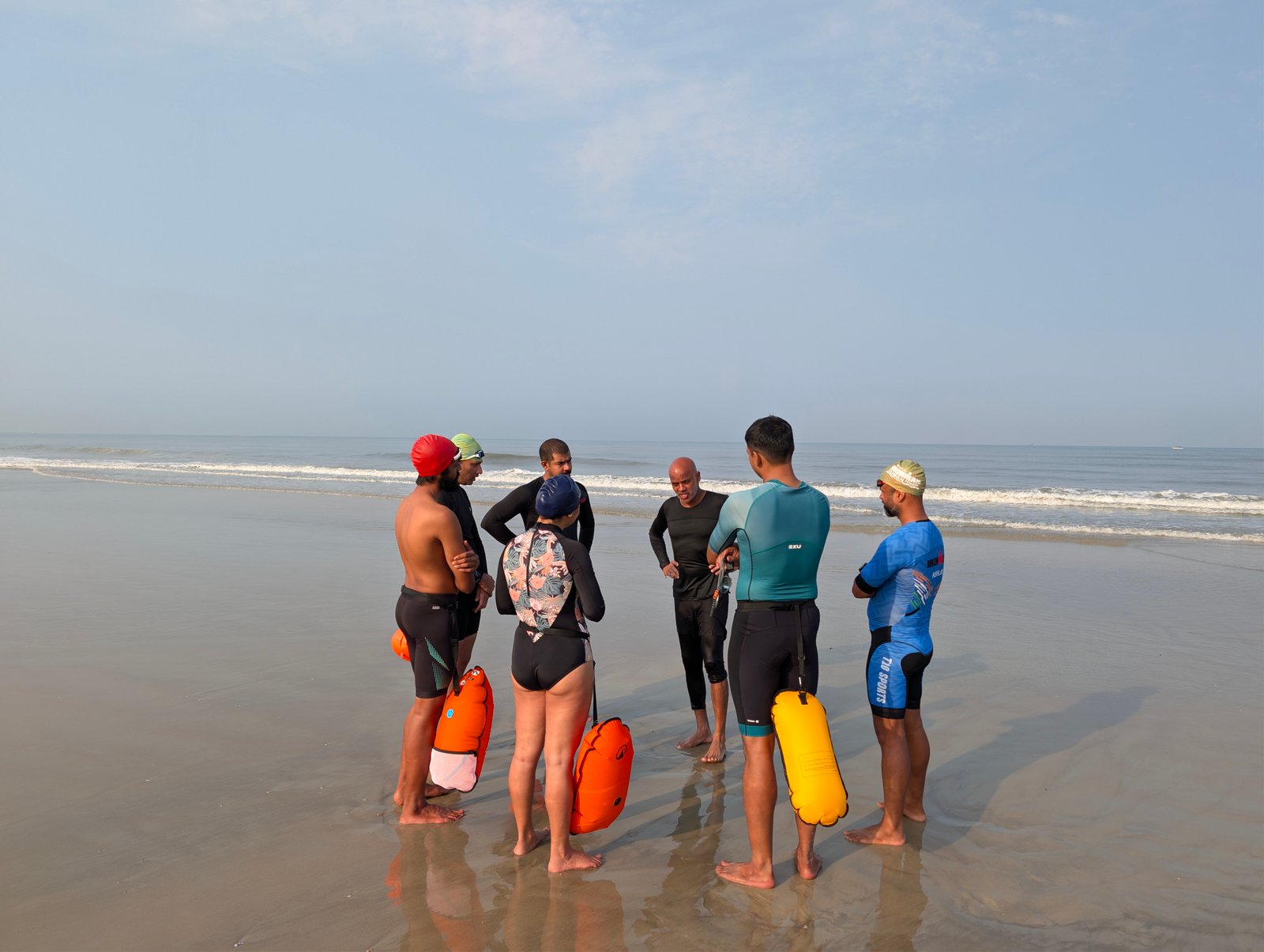 Athletes training in open water at the Goa triathlon camp